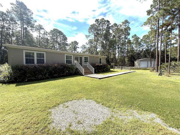 1161 LAKE HARNEY WOODS BOULEVARD, MIMS, FL 32754
