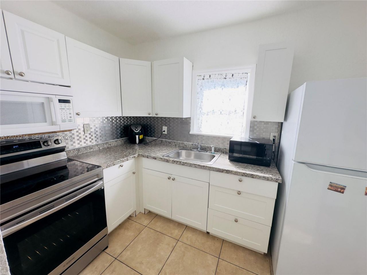 301 NW 37th St, Unit CU1, Miami, FL 33127 Photo
