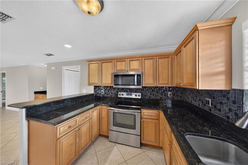 4205 SE 19th Ave , Unit 203, Cape Coral, FL 33904 Photo