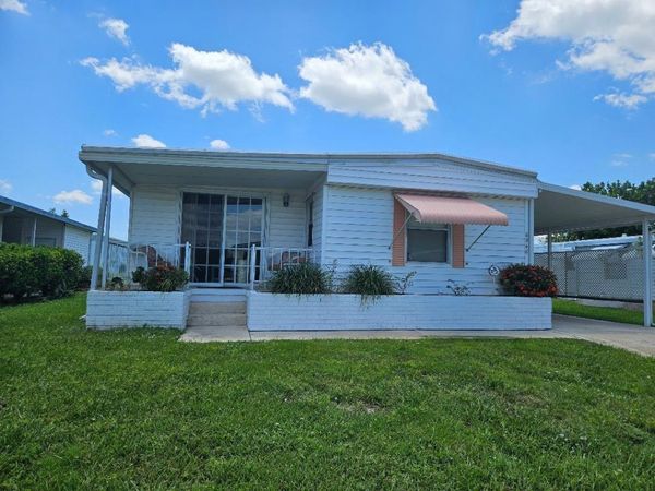 6948 SE DELEGATE Street, Hobe Sound, FL 33455