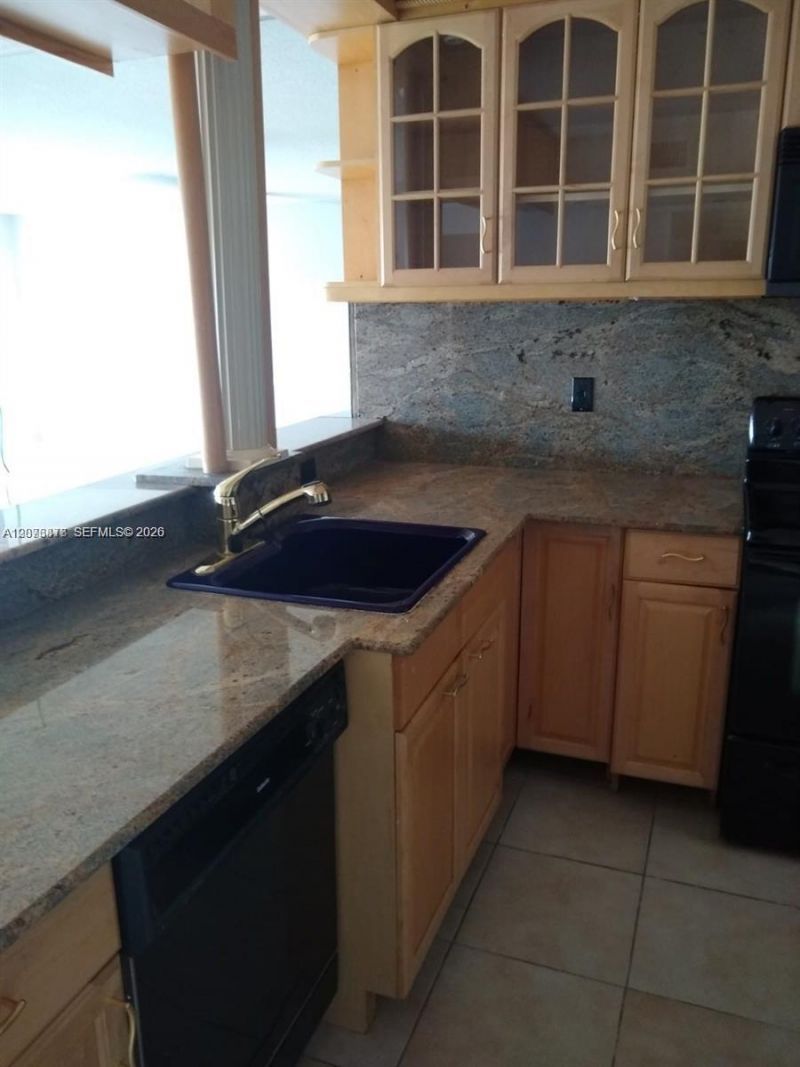 401 Golden Isles Dr , Unit 211, Hallandale Beach, FL 33009 Photo