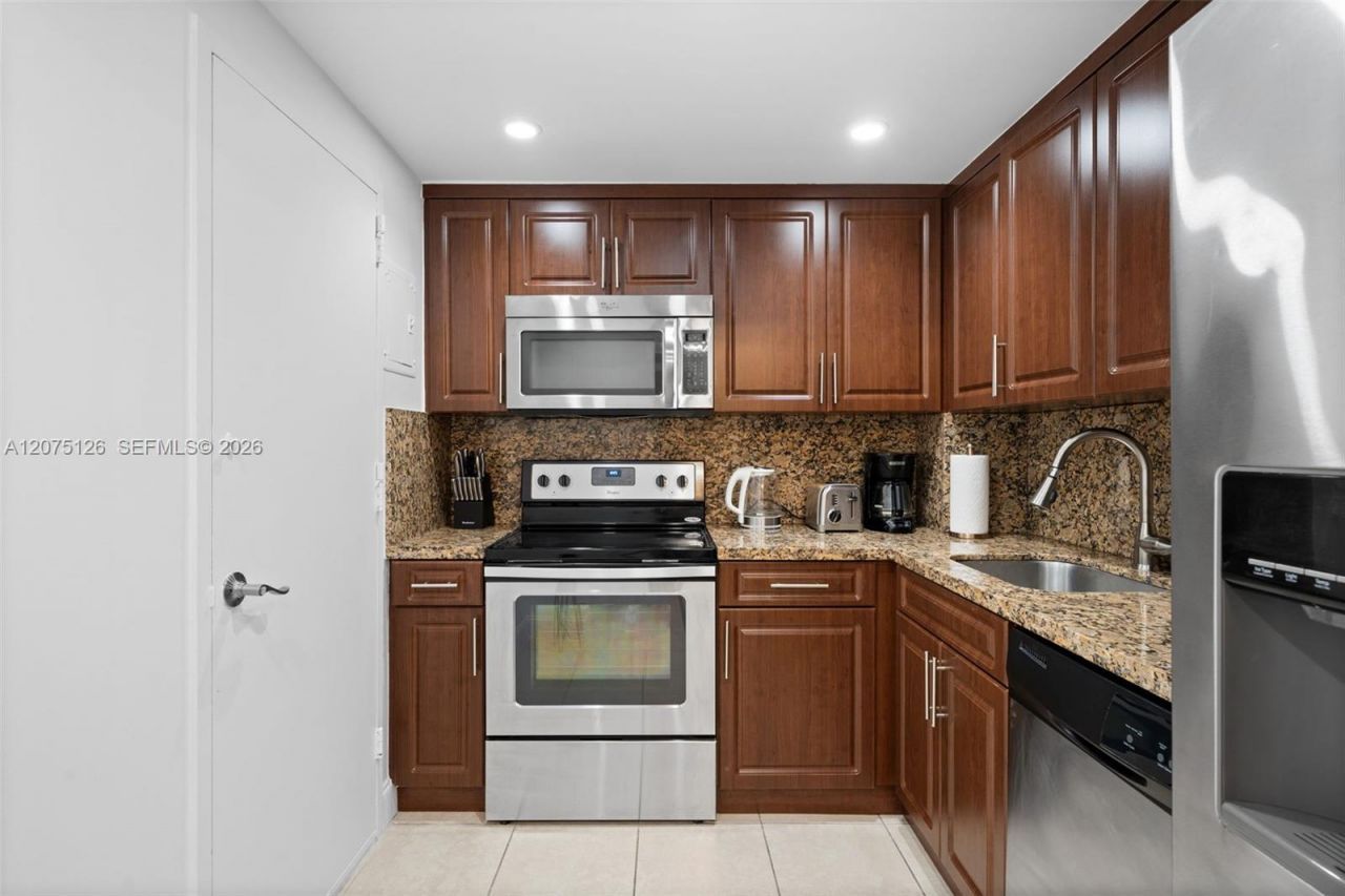401 Golden Isles Dr , Unit 406, Hallandale Beach, FL 33009 Photo