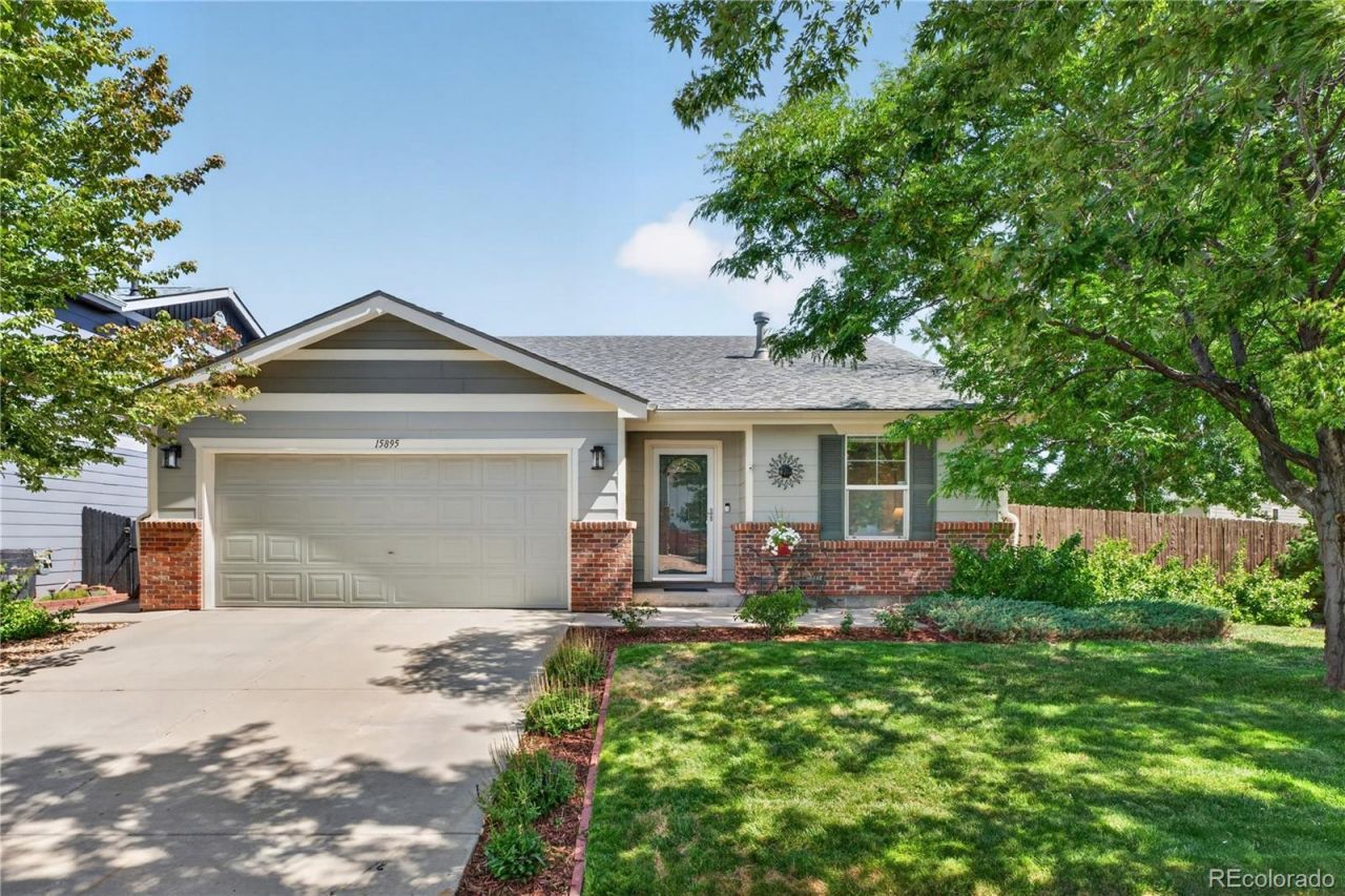 15895 Robins Drive, Denver, CO 80239 Main Photo