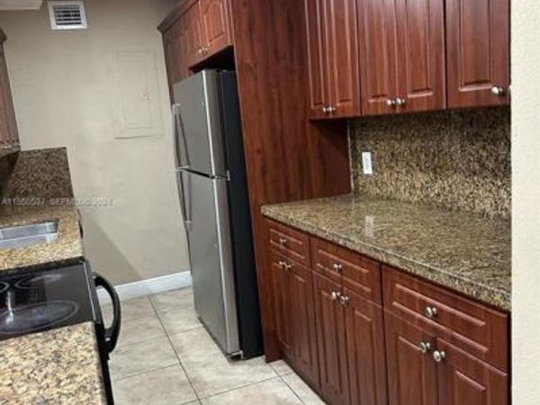 4533 TREEHOUSE Lane, Unit H, Tamarac, FL 33319