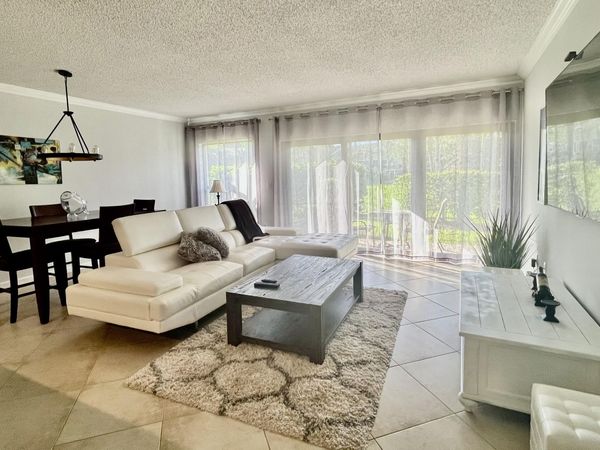 11863 Wimbledon Circle, Unit 401, Wellington, FL 33414