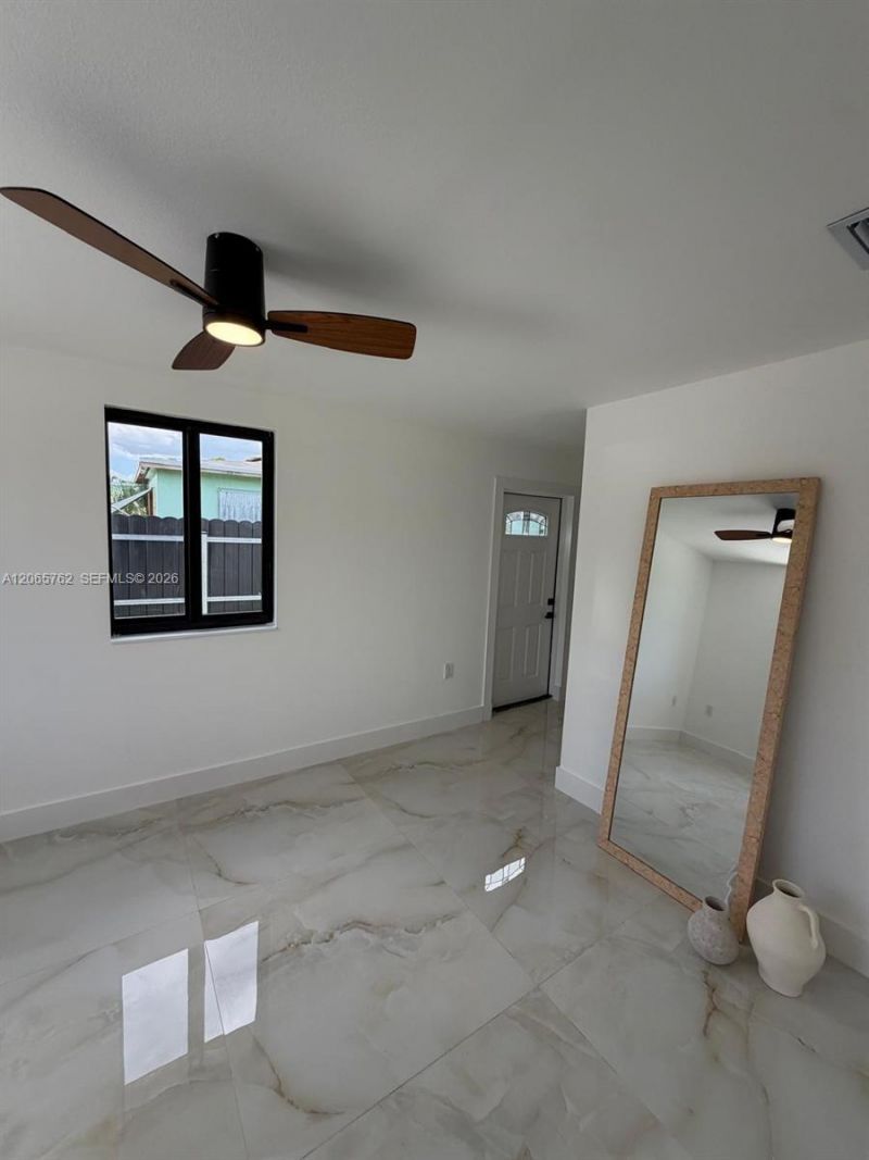 1055 NW 143rd St , Miami, FL 33168 Photo