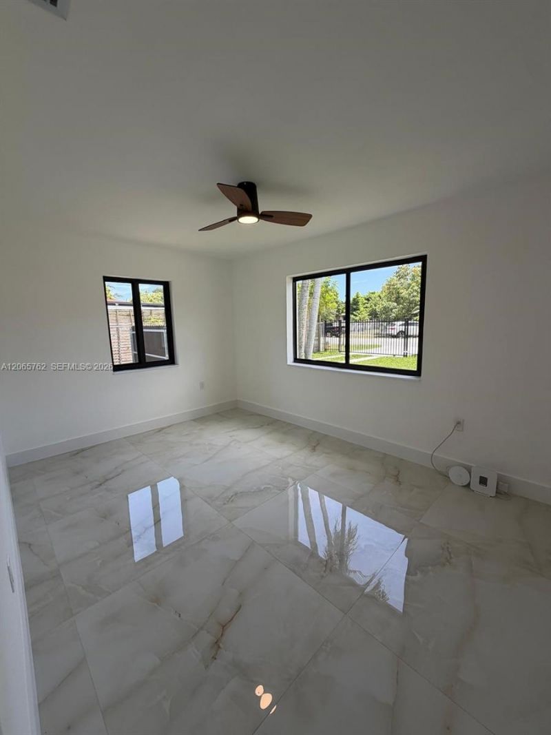 1055 NW 143rd St , Miami, FL 33168 Photo