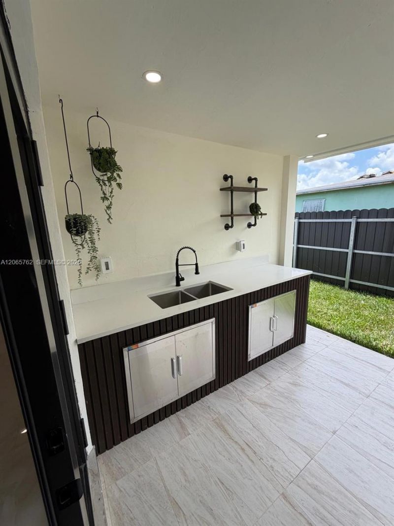 1055 NW 143rd St , Miami, FL 33168 Photo