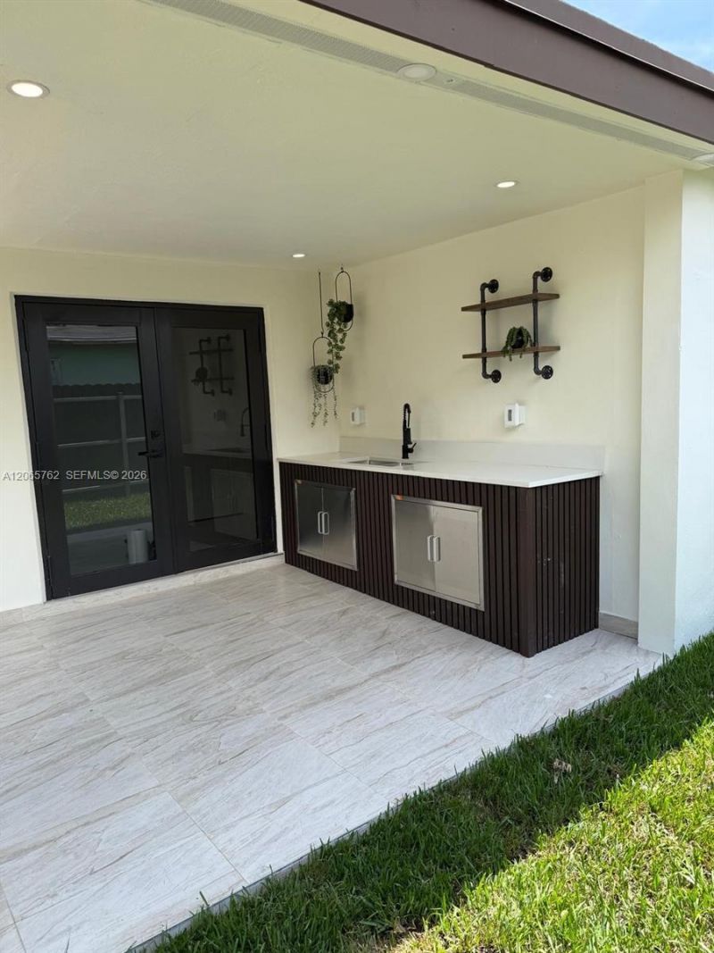 1055 NW 143rd St , Miami, FL 33168 Photo