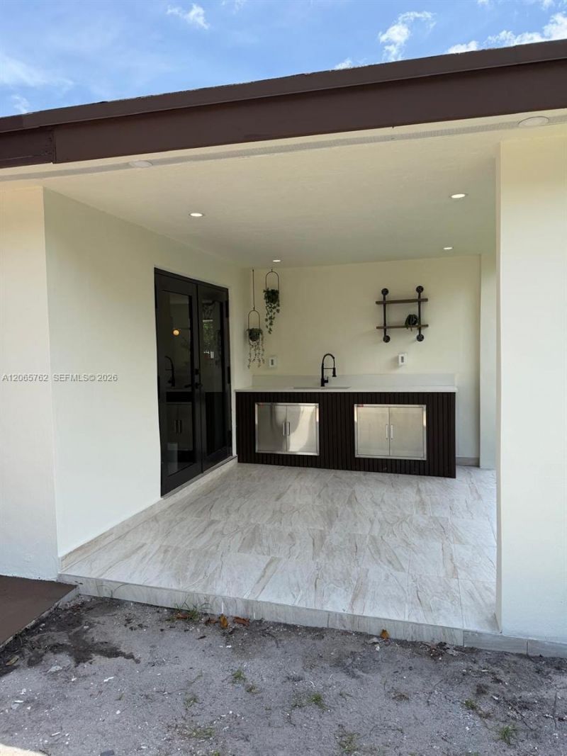 1055 NW 143rd St , Miami, FL 33168 Photo