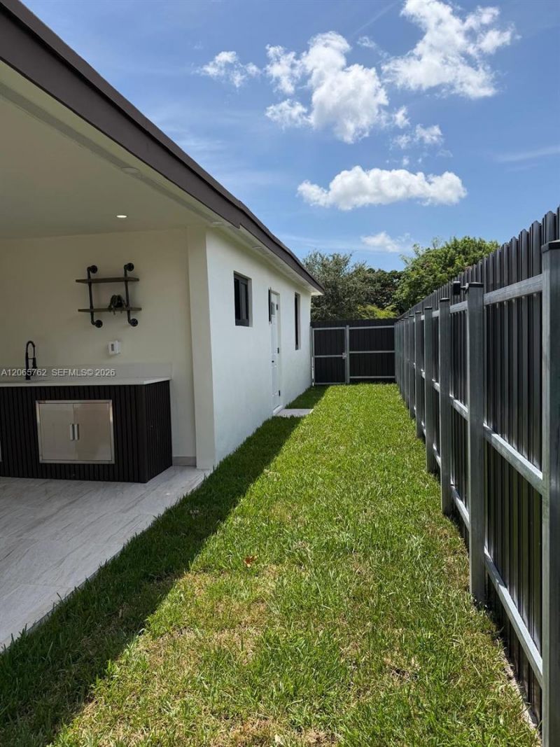 1055 NW 143rd St , Miami, FL 33168 Photo