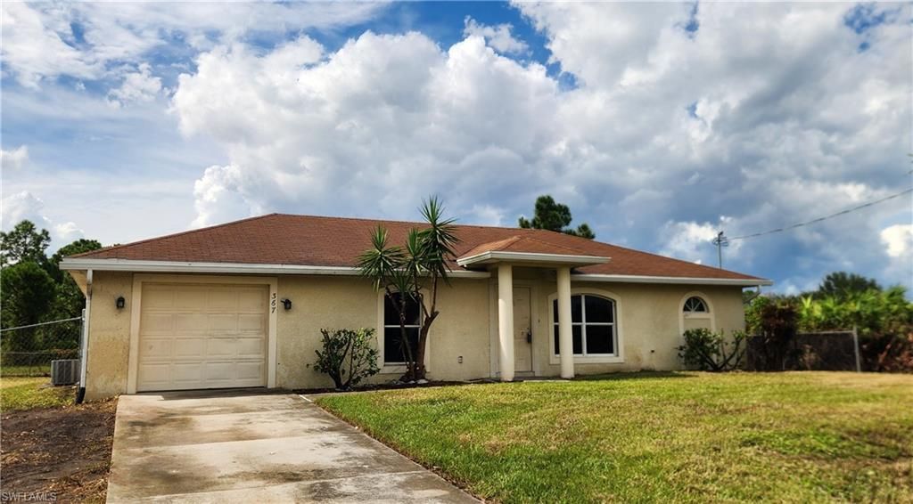 367 Peerless St, Lehigh Acres, FL 33974 Photo