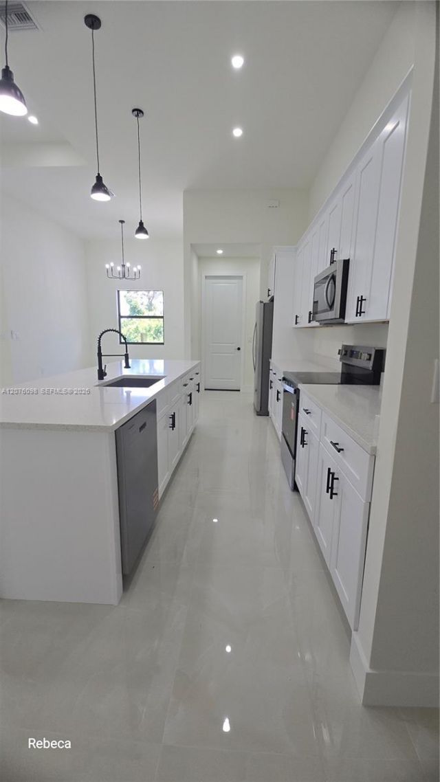 580 Woodview Dr , Lehigh Acres, FL 33972 Photo