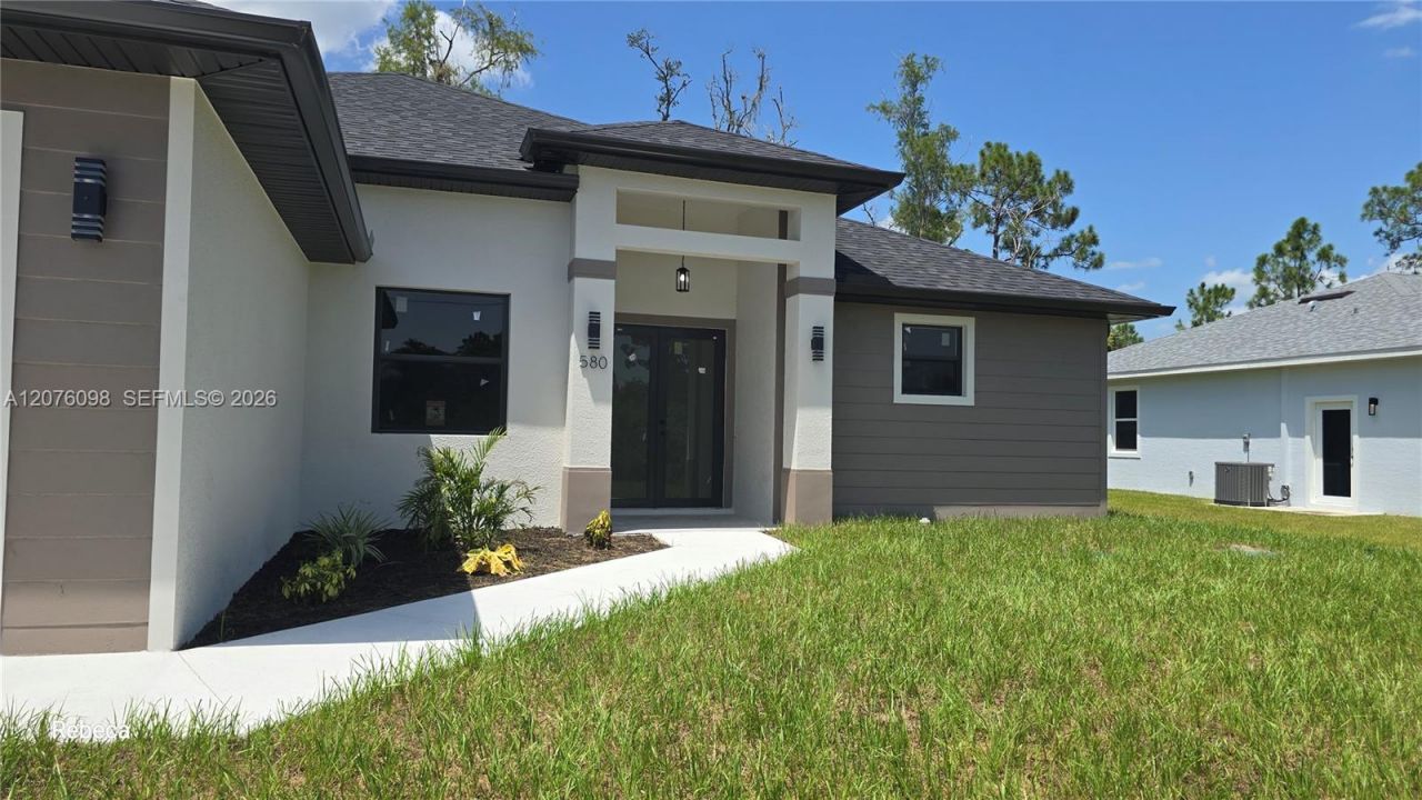 580 Woodview Dr , Lehigh Acres, FL 33972 Photo