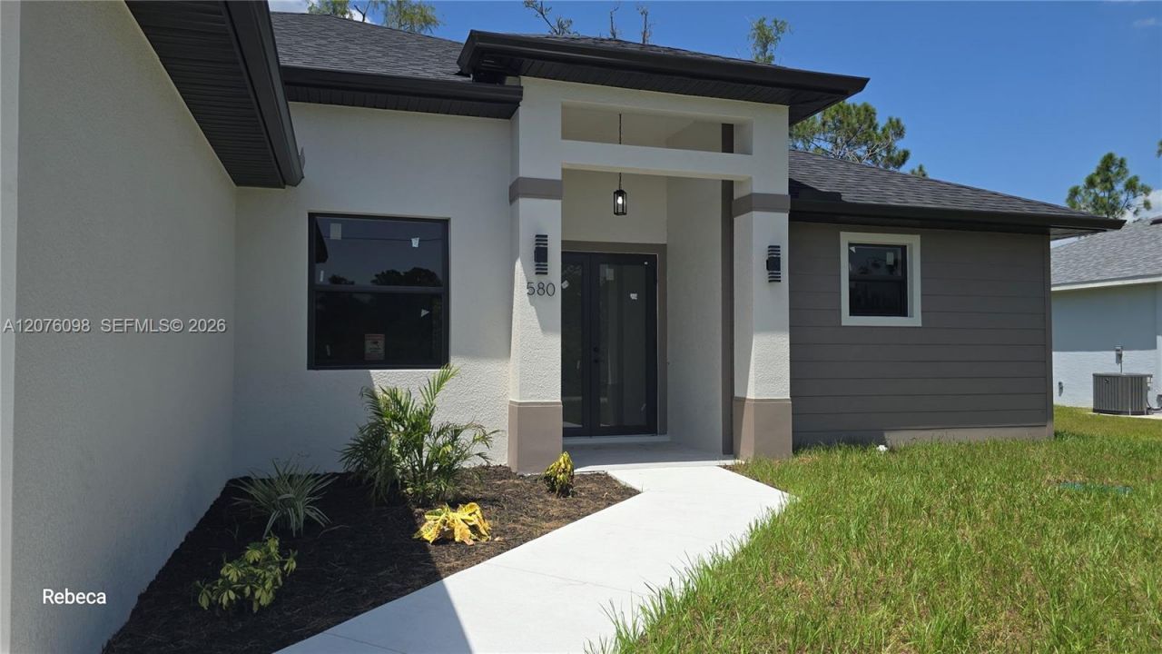 580 Woodview Dr , Lehigh Acres, FL 33972 Photo