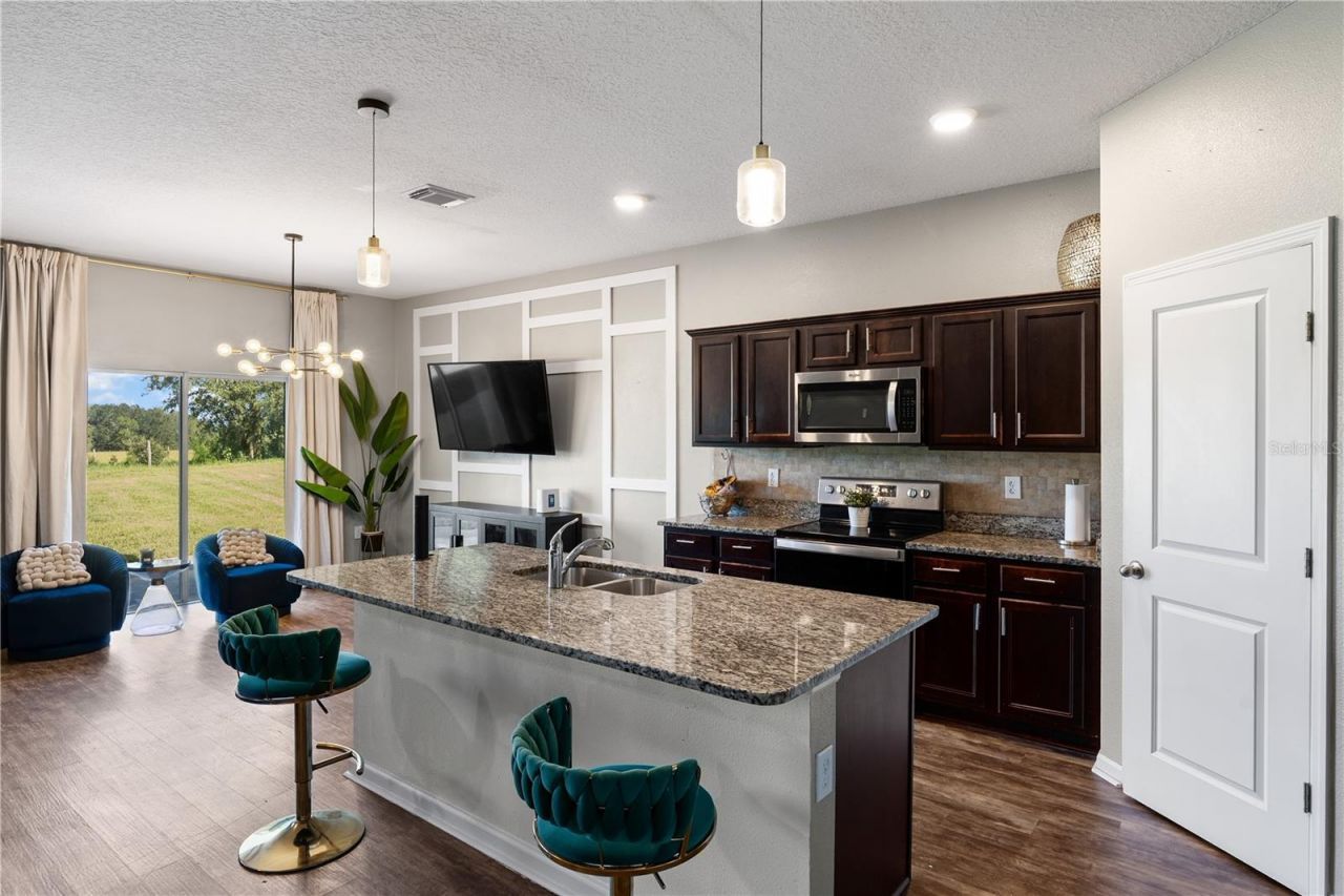 15623 Merlin Avenue , Mascotte, FL 34753 Photo
