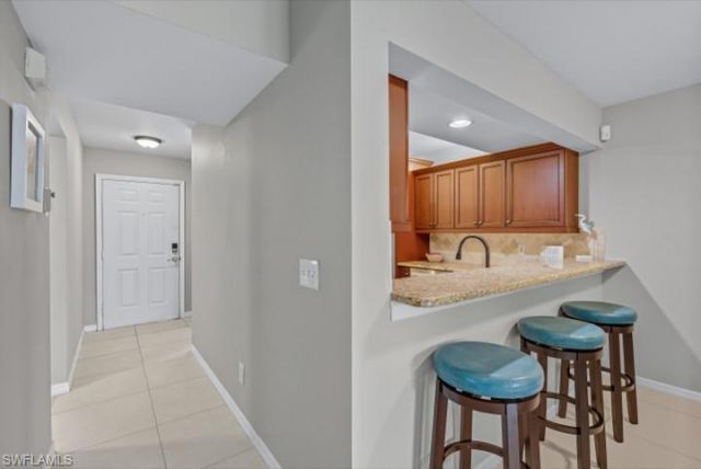 145 Robin Hood Cir, Unit 104, Naples, FL 34104 Photo