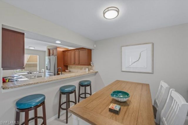 145 Robin Hood Cir, Unit 104, Naples, FL 34104 Photo