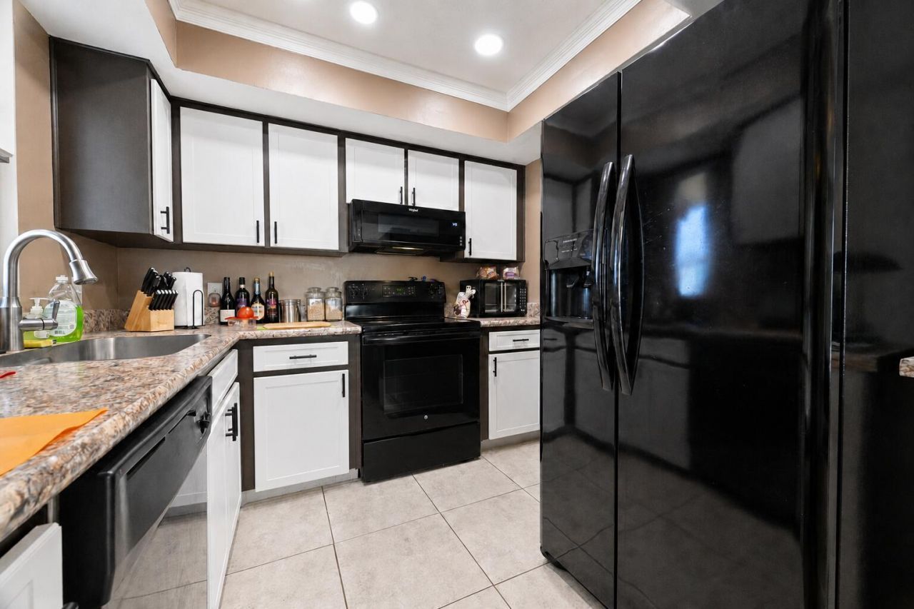 1673 SE Green Acres Circle, Unit NN201, Port Saint Lucie, FL 34952 Photo
