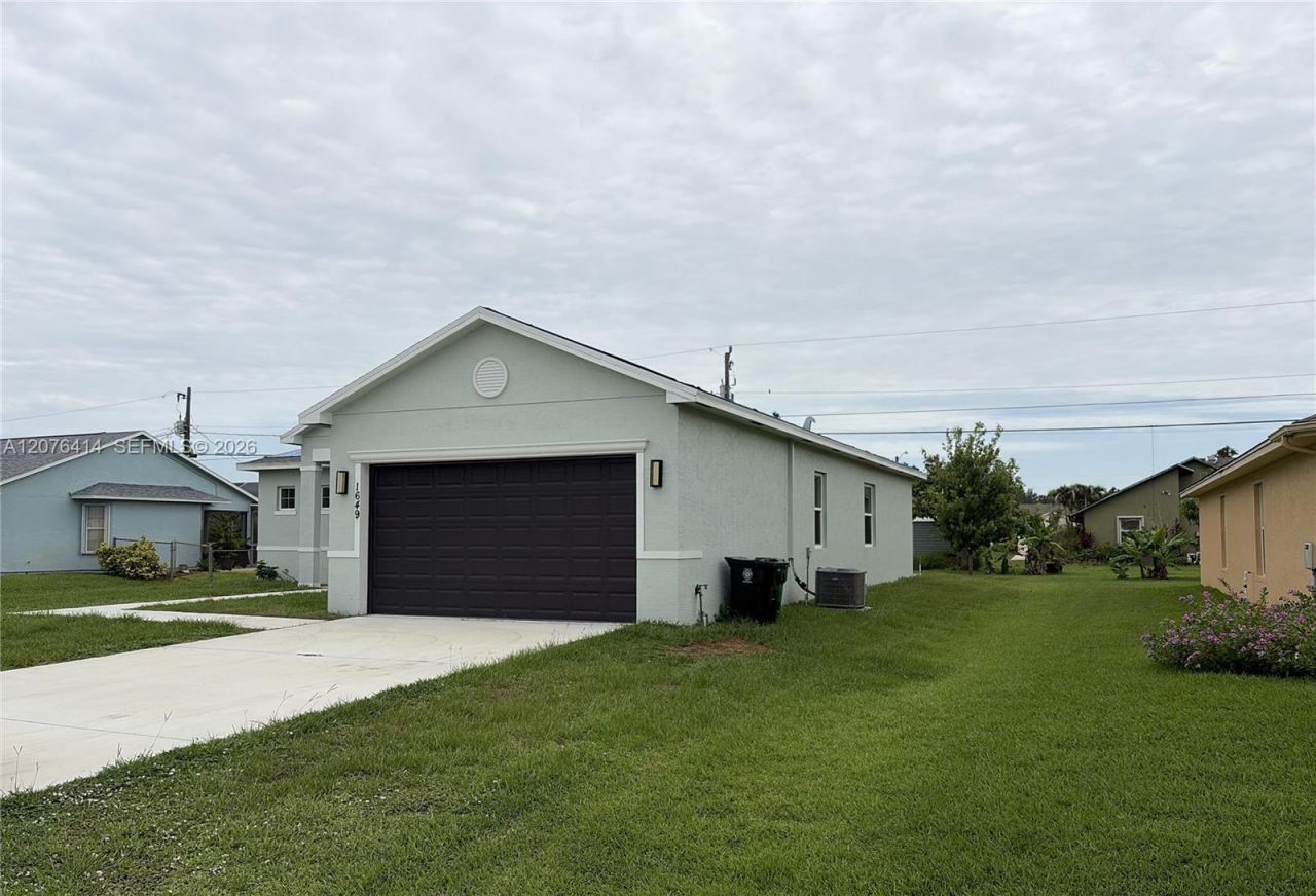 1649 SW Merchant Ln, Port Saint Lucie, FL 34953 Photo