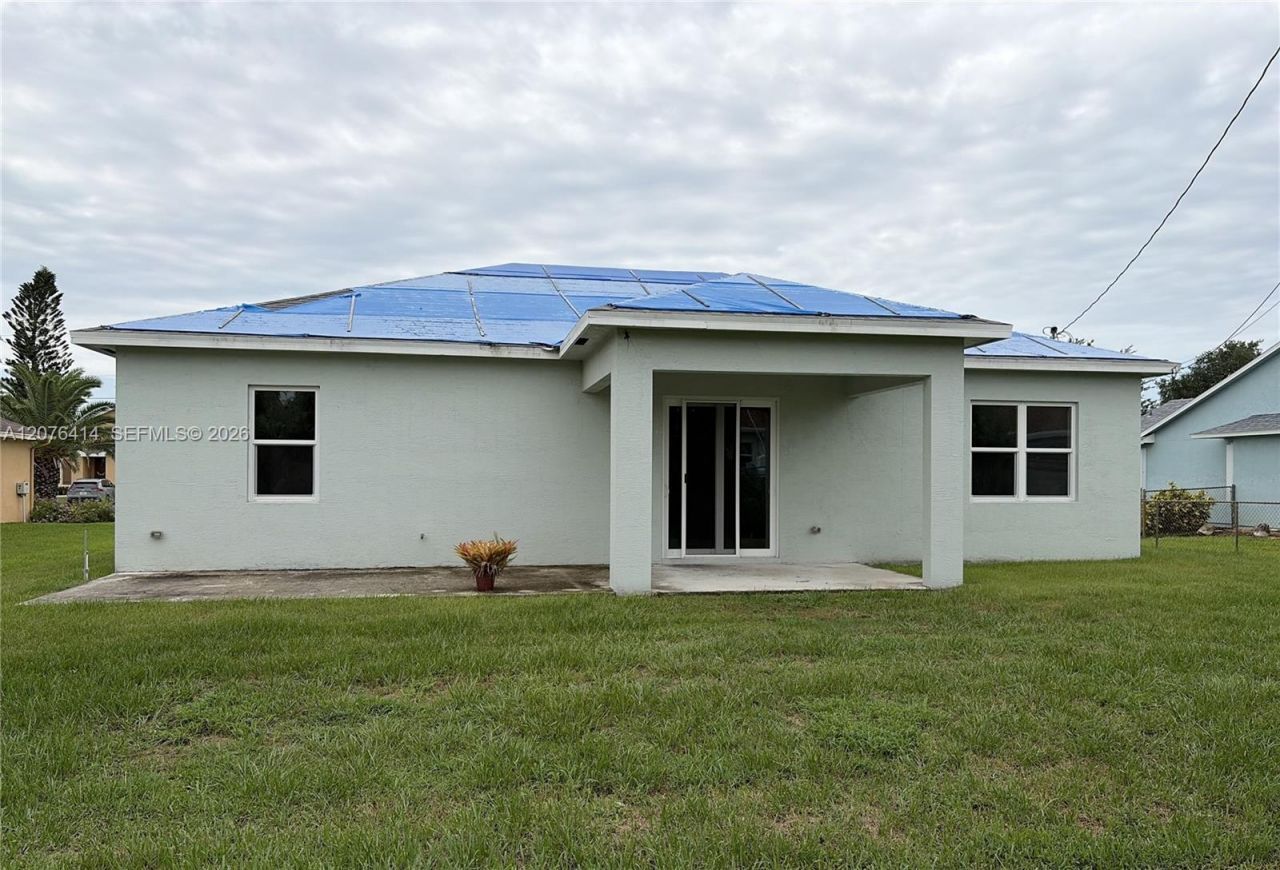 1649 SW Merchant Ln, Port Saint Lucie, FL 34953 Photo