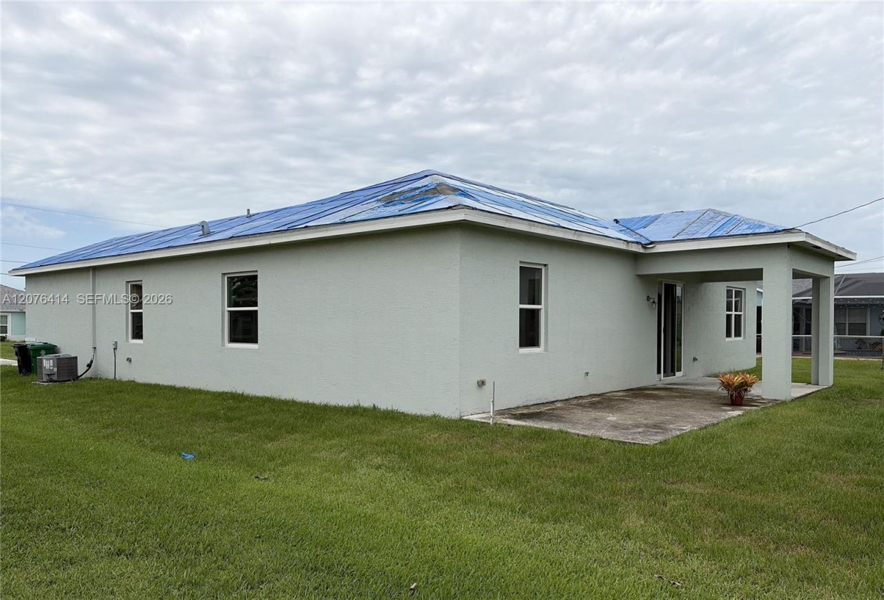 1649 SW Merchant Ln, Port Saint Lucie, FL 34953 Photo