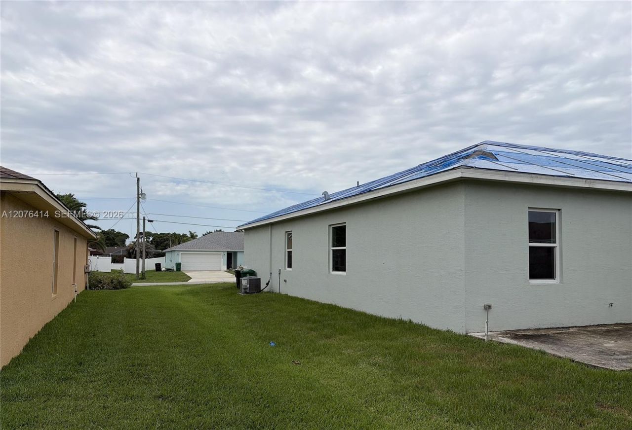 1649 SW Merchant Ln, Port Saint Lucie, FL 34953 Photo