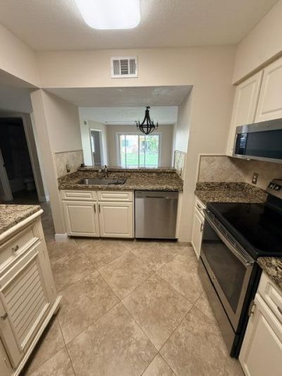 1035 Lake Shore Drive, Unit 103, Lake Park, FL 33403 Photo