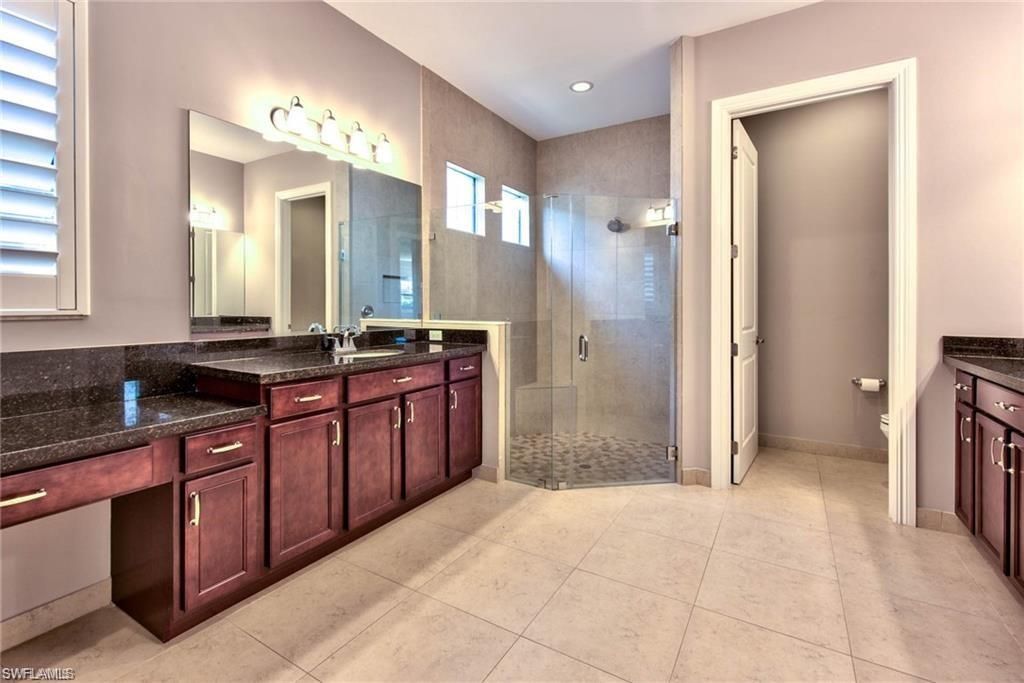 9336 Woodhurst Dr , Naples, FL 34120 Photo