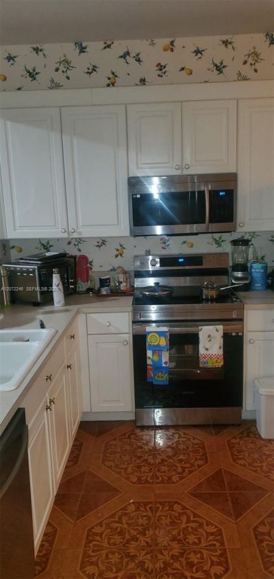 7775 Yardley Dr , Unit 211, Tamarac, FL 33321 Photo