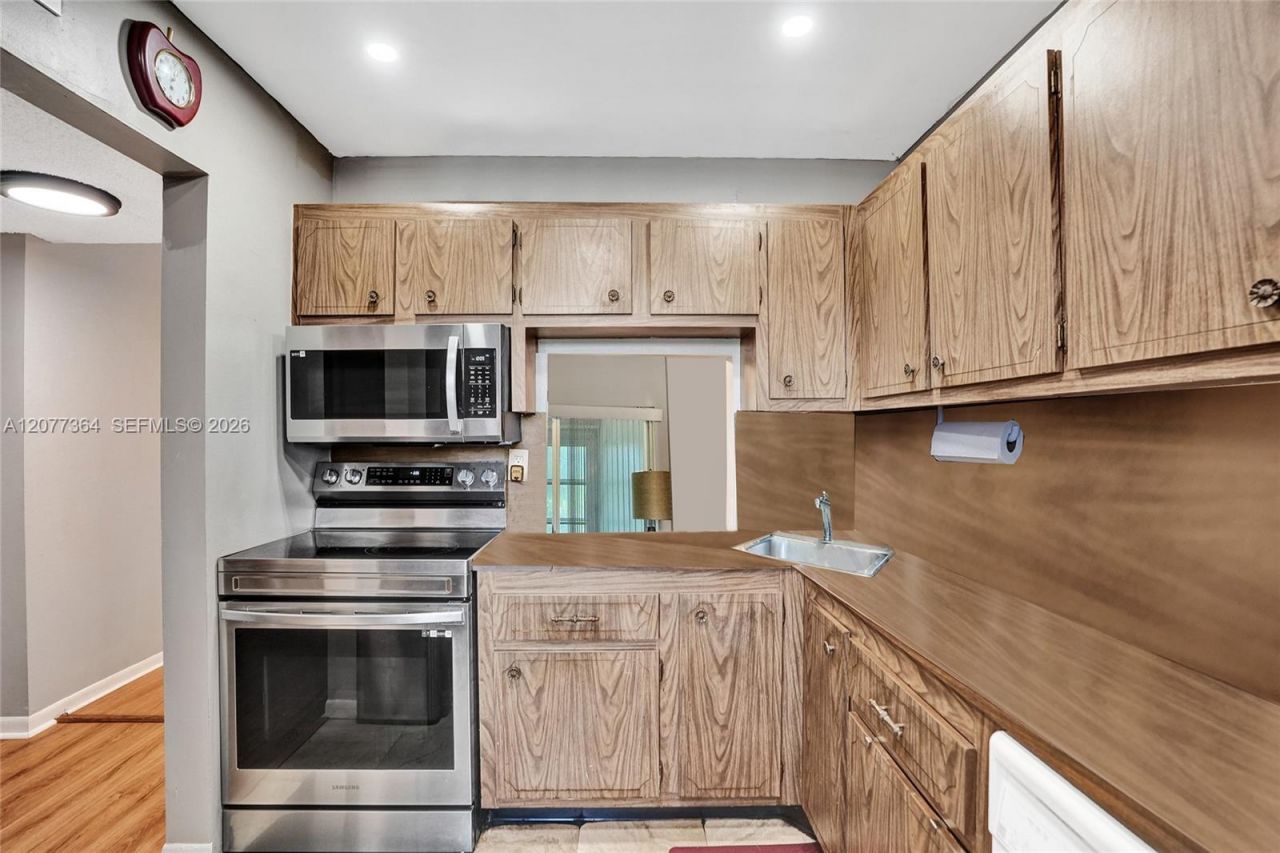 5961 NW 61st Ave , Unit 310, Tamarac, FL 33319 Photo