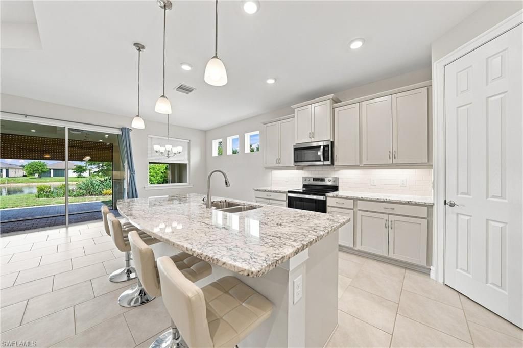 719 Heather Lake Ave , Cape Coral, FL 33993 Photo