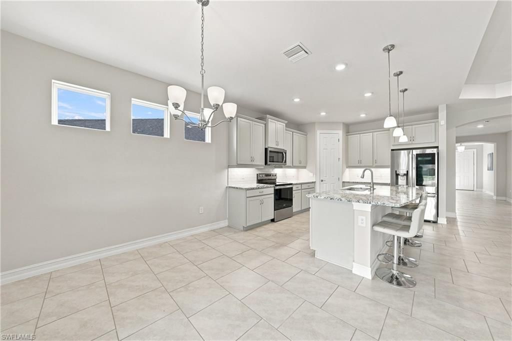 719 Heather Lake Ave , Cape Coral, FL 33993 Photo