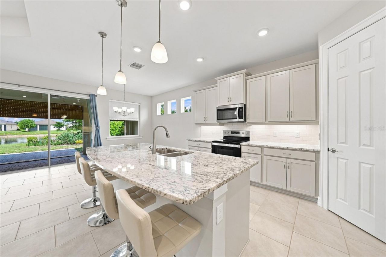 719 Heather Lake Avenue, Cape Coral, FL 33993 Photo