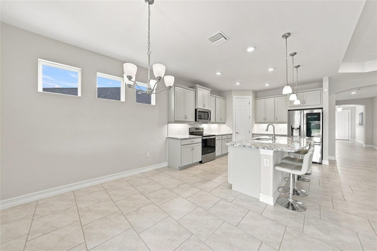 719 Heather Lake Avenue, Cape Coral, FL 33993 Photo