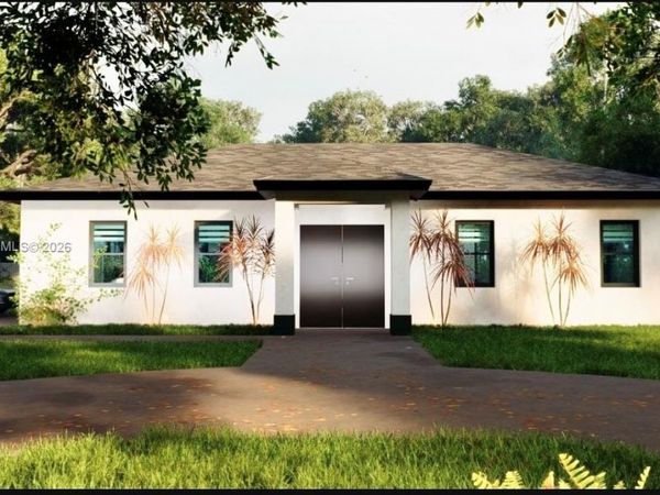911 Ardmore St , Lehigh Acres, FL 33974