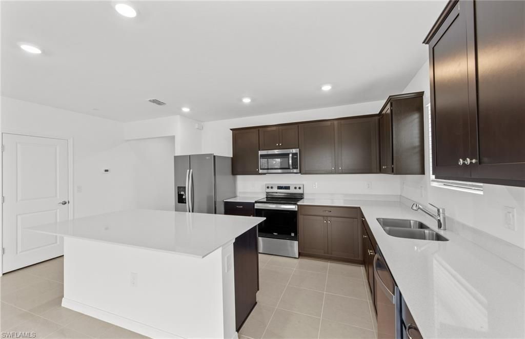 624 Oasis Lake Pl , Lehigh Acres, FL 33936 Photo
