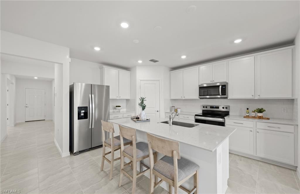 612 Oasis Lake Pl , Lehigh Acres, FL 33936 Photo