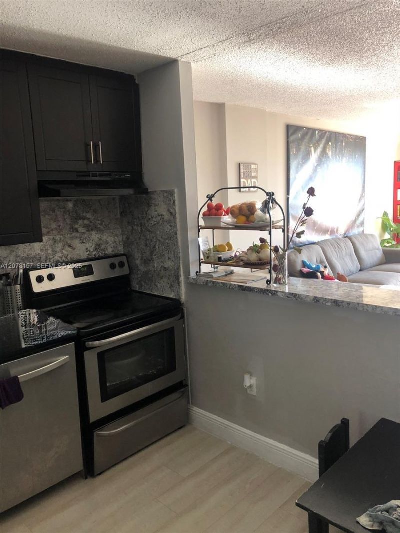 16851 NE 23rd Ave , Unit B402, North Miami Beach, FL 33160 Photo