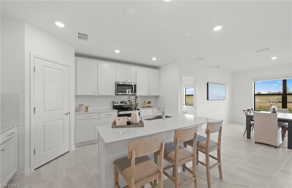 238 Silent Lake Dr , Lehigh Acres, FL 33936 Photo
