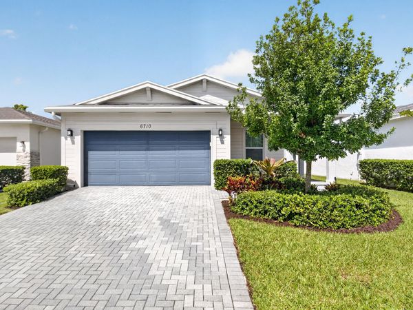 6710 POINTE OF WOODS Drive, West Palm Beach, FL 33413
