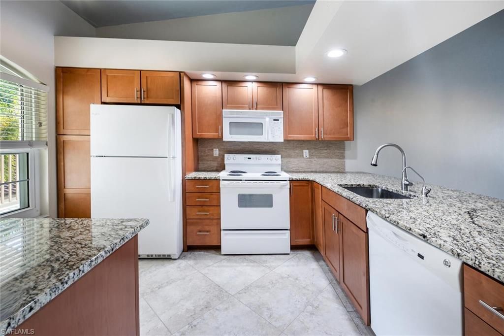 242 Newport Dr , Unit 509, Naples, FL 34114 Photo