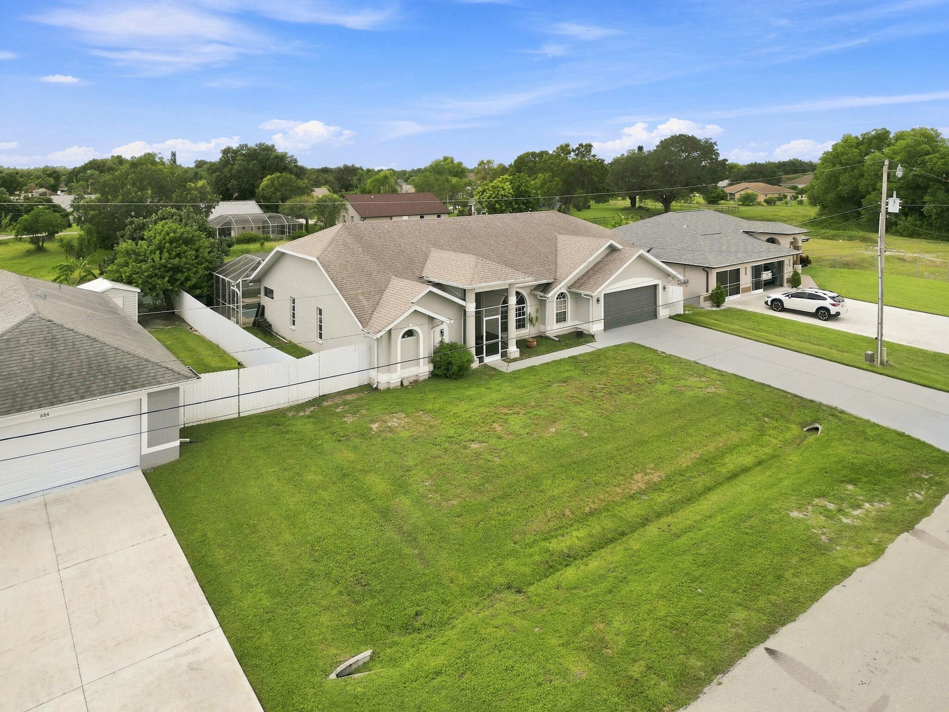680 Manhattan Street E, Lehigh Acres, FL 33974 Photo