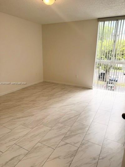 6955 NW 186th St , Unit F306, Hialeah, FL 33015 Photo