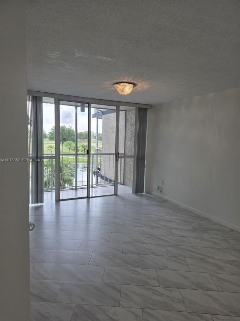 6955 NW 186th St , Unit F306, Hialeah, FL 33015 Photo