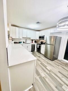 512 Bayberry Drive, Lake Park, FL 33403 Photo