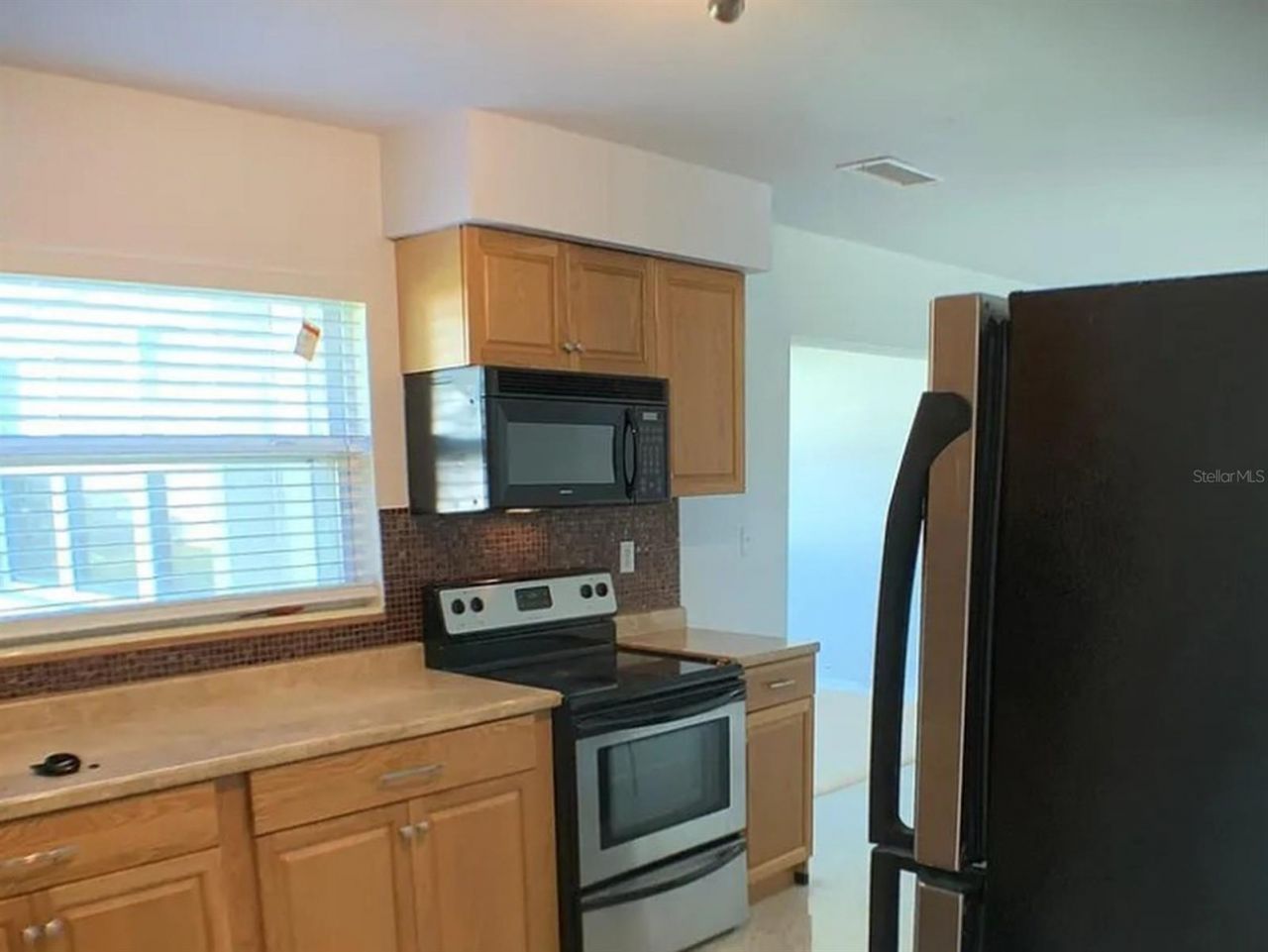 5003 58th Way N, Kenneth City, FL 33709 Photo