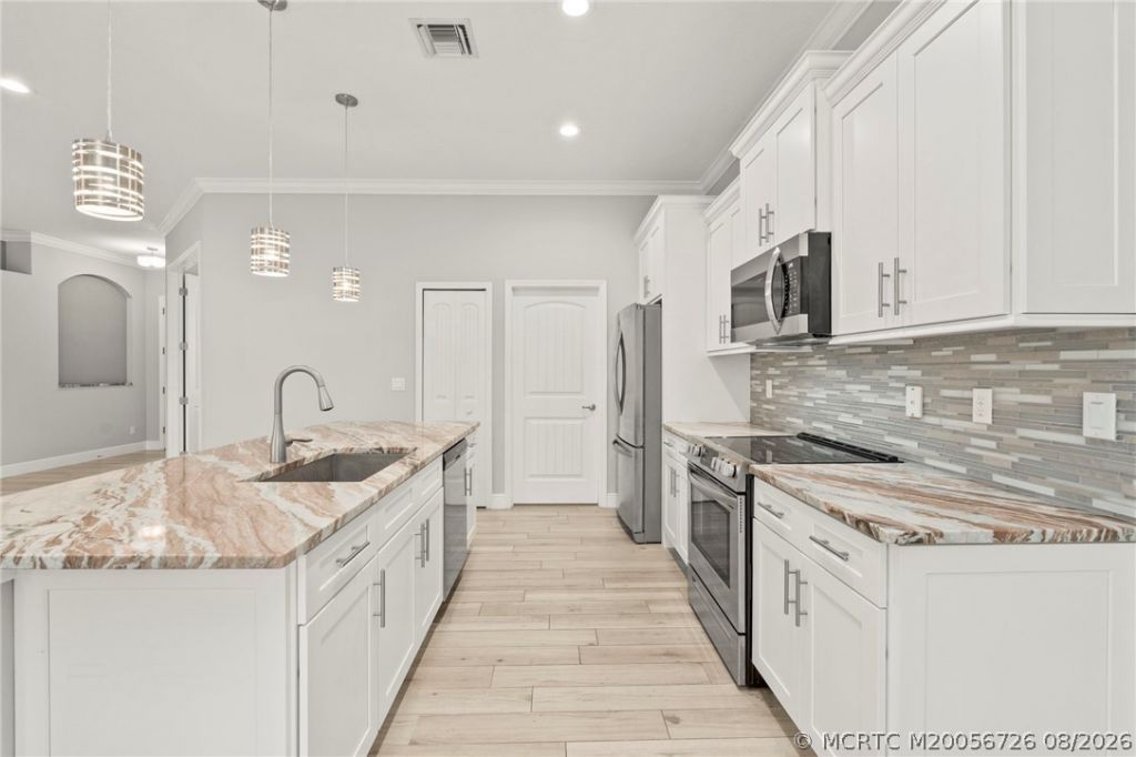 4262 SW Ragen Street, Port Saint Lucie, FL 34953 Photo