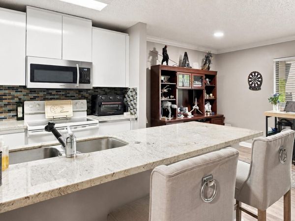 711 FOREST CLUB Drive, Unit 119, Wellington, FL 33414
