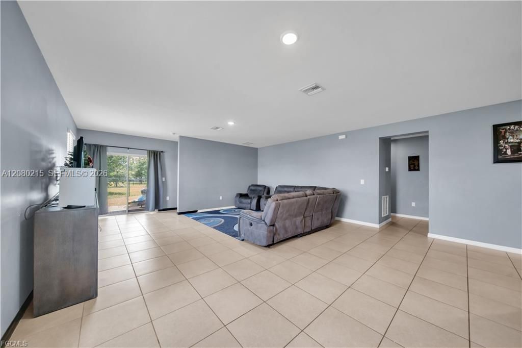 10549 Canal Brook Ln , Lehigh Acres, FL 33936 Photo